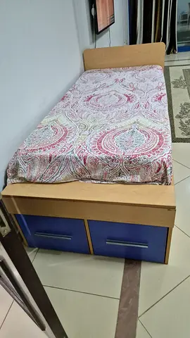 Single wooden bed frame with under-drawer storage and mattress