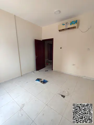 Two-bedroom apartment with a living room available for annual rent in Al Nakheel, Ajman. The apartment consists of two bedrooms and a living room, wi