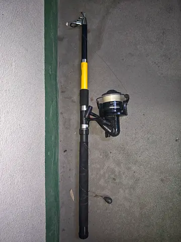 Telescopic Spinning Fishing Rod with Reel - in good condition
