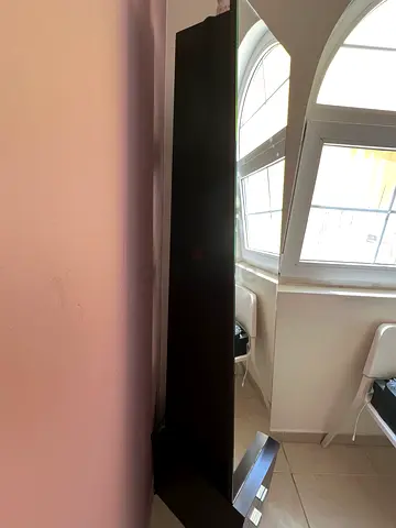 Tall narrow black shelving cabinet / wardrobe with mirror - good condition