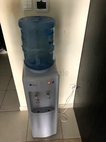 White standing water cooler dispenser
