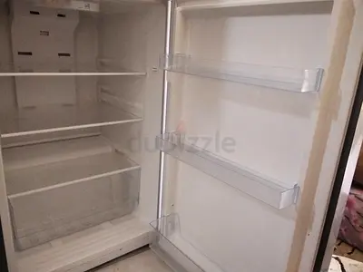 Used single-door refrigerator - clean interior, working condition