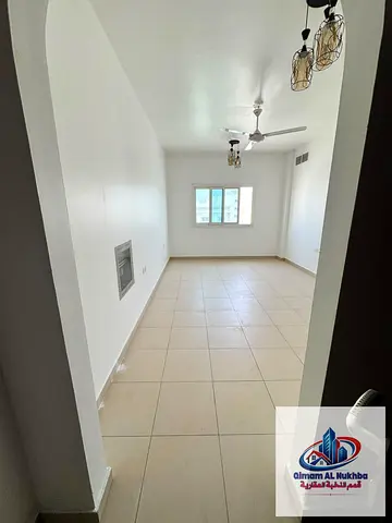 Near beach. Spacious 1BR for rent in Al Qulaiaa. 2 baths, central AC/gas, free maintenance & easy payments.
