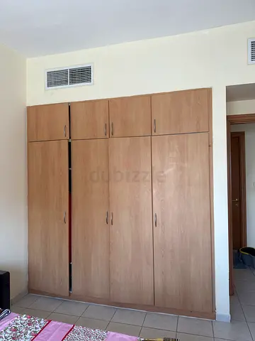 A room with attached washroom is available for a working Indian lady in a clean apartment.