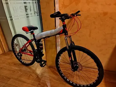 Red & Black Mountain Bike - 26" Frame, Front Suspension, New Condition