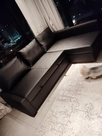 Black L-shaped Leather Sofa - Excellent Condition