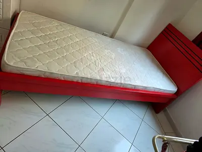 Single wooden bed frame with mattress - red, good condition