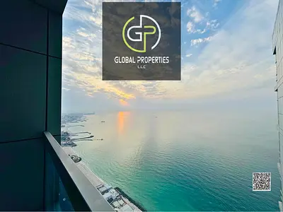 Huge 2BHK in Corniche Tower, Ajman! 2,200 sqft, full sea view, big balcony, 3 baths, closed kitchen