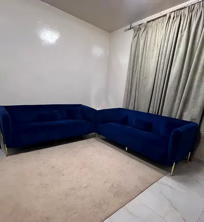 Blue velvet L-shaped 2-piece sofa set – good condition
