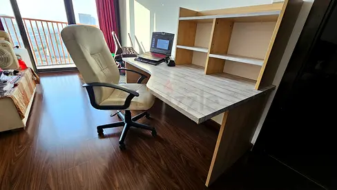 Large wooden computer desk with hutch and ergonomic office chair