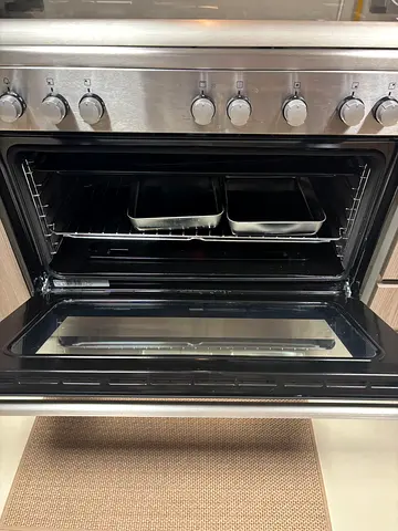 Stainless steel freestanding oven with double oven cavity - good condition