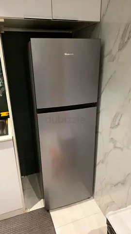 Silver two-door refrigerator in good condition