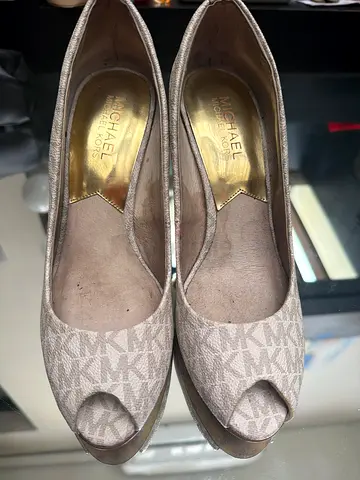 Michael Kors beige monogram peep-toe flats, size not specified