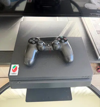 PlayStation 4 Slim with controller - good working condition