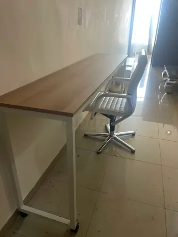 Long wooden office table / workstation - good condition