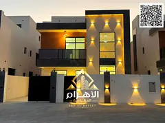 For sale: Luxurious modern villa in Al Helio, Ajman | 3 floors | 6 master bedrooms | Roof | Includes