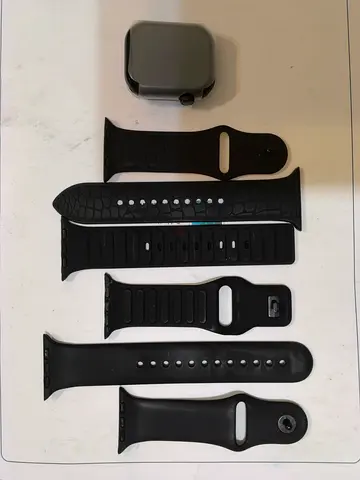 Smart Watch with 6 black silicone bands with charger