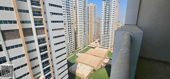 A spacious 2-bedroom apartment with a living area (2BHK) and a partial view is available for rent in Tower 7.