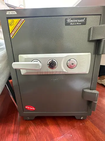 Heavy-duty floor safe with combination and key locks
