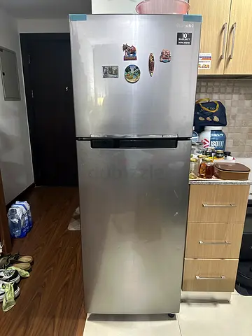 Standing double -door refrigerator - good working condition