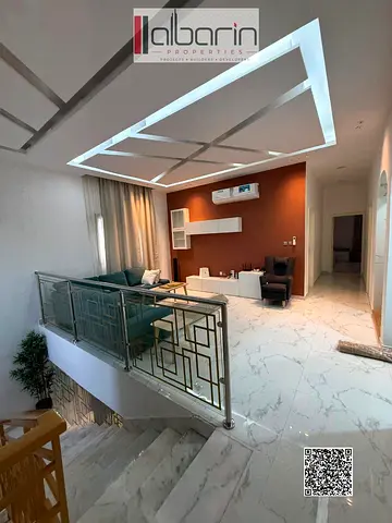 Luxurious furnished 5-bedroom villa with a living room for rent in Al Rawda 1 – strategic location.