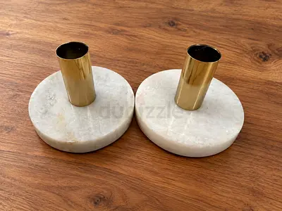 Pair of marble and brass candle holders