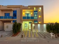 Villa for sale in Al Helio, Ajman—registration fees included. Features 6 master bedrooms, a majlis