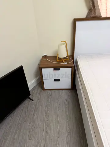 King size bed, king mattress, 2 x bedside table, and tall boy with drawers - good condition