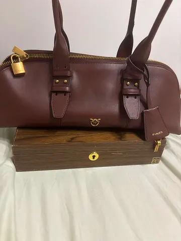 Brown leather tote bag with lock and tag - gently used