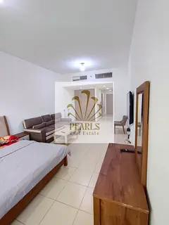 For sale in Ajman One Towers: a spacious studio on the first floor with a garden view. Located in a