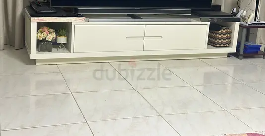 white TV cabinet with storage and glass top - Excellent condition