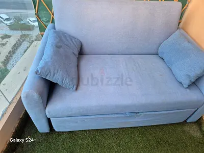 Light blue 2-seater sofa bed - good condition