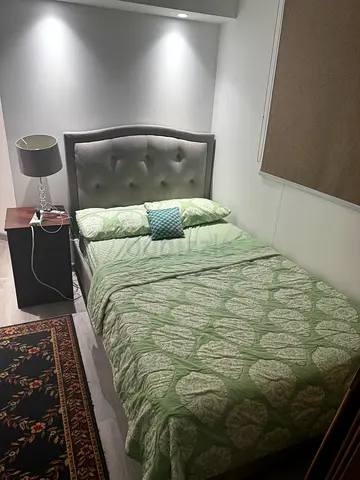 Queen bed with upholstered headboard and mattress - light grey