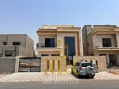 **Luxury Modern Villa for Sale in Al Helio 2 – Ajman | Fees Included | Two Floors Plus Roof Terrac