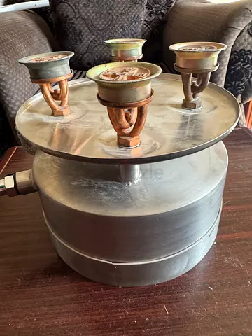 vintage four-burner kerosene pressure stove