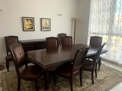 Classic Dark Wood Dining Set with Carved Details