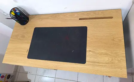 Compact oak-look study desk with cable slot and mat — good condition