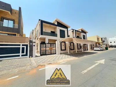 A spacious family villa is available for annual rent in Al Yasmeen, Ajman. The villa offers a practical layout with 5 master bedrooms,