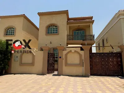 For Annual Rent in Al Muwaihat – Ajman | Luxury Villa | 5 Master Bedrooms | 2 Living Rooms | Majlis | Maid’s Room | Balcony | Large Outdoor Setback |