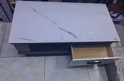 White marble-top TV cabinet with storage drawer