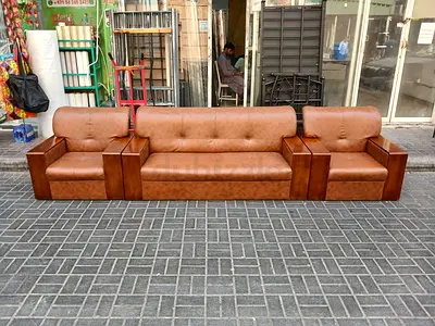 3-piece brown leather sofa set with built-in side tables