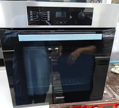Miele brand built-in electric oven 60cm lastest version it's Same like brand new