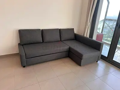 Grey L-shaped Sofa / Sofa Bed - Good Condition