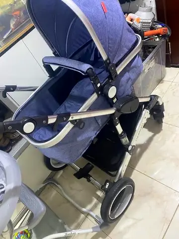 Blue all-terrain baby stroller / pram - good condition