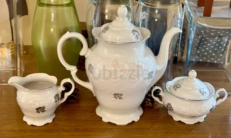 An antique White Porcelain Tea Set - Teapot with Sugar Bowl and Creamer from poland