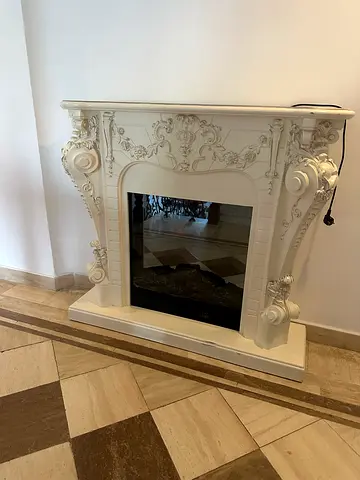 Ornate White Fireplace Mantel - Classic Carved Design