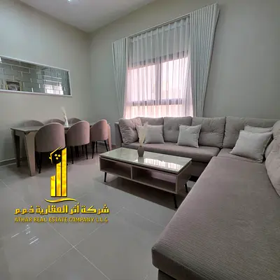 Luxury apartment, second occupancy. Two bedrooms, living room, and open balcony. Ajman Corniche. Fully furnished for monthly rent. Rent includes