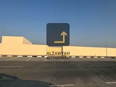 20,000 Sq.Ft Walled Yard for Rent | 50 KV Power | Corner Plot | Al Sajja