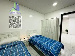 An exceptionally luxurious and high-end two-bedroom apartment with a living room, fully furnished wi