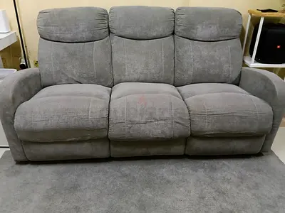 Grey 3-seater reclining sofa in good used condition